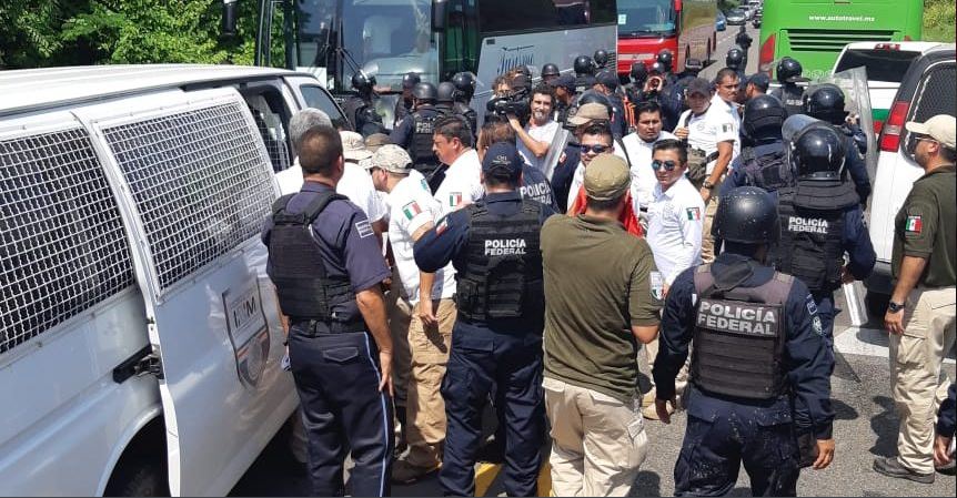 policia detiene migrantes