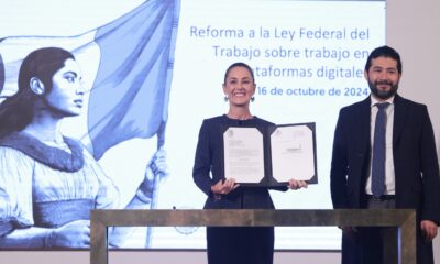 Firma Sheinbaum iniciativa para proteger a repartidores de aplicaciones